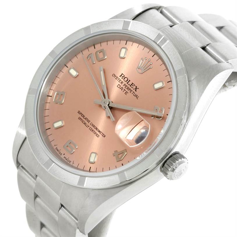 The image shows a Rolex Oyster Perpetual Date model watch at a slight angle, highlighting its face, bezel, and bracelet.