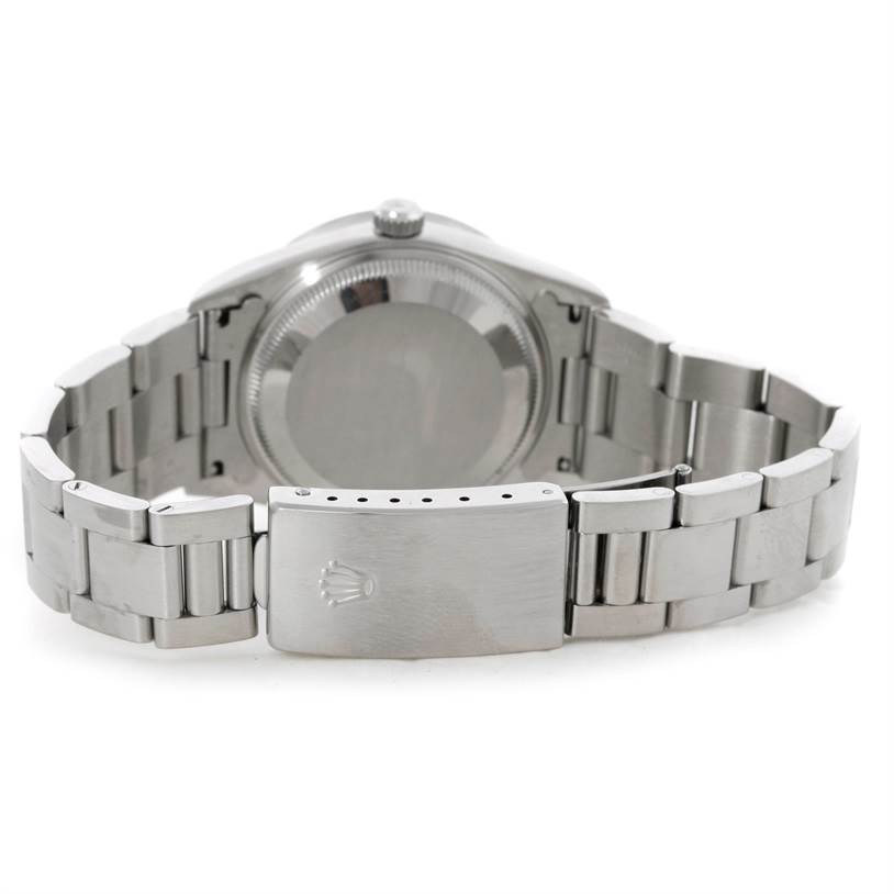 The image shows the back side and clasp of a Rolex Date 15210 Men's Stainless Steel Pink Dial 15210 Men's Stainless Steel Pink Dial model watch.