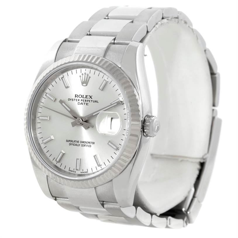 The Rolex Date 115234 Men's Stainless Steel Silver Dial 115234 Men's Stainless Steel Silver Dial model watch is shown at an angled front view, highlighting its dial, bracelet, crown, and cyclops lens over the date window.