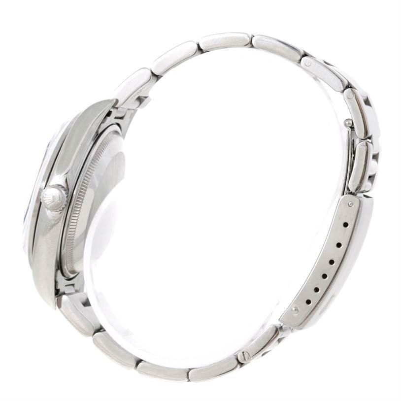 The Rolex Date 15200 Men's Stainless Steel Blue Dial 15200 Men's Stainless Steel Blue Dial model is shown from a side angle, featuring the crown, case, and part of the bracelet.