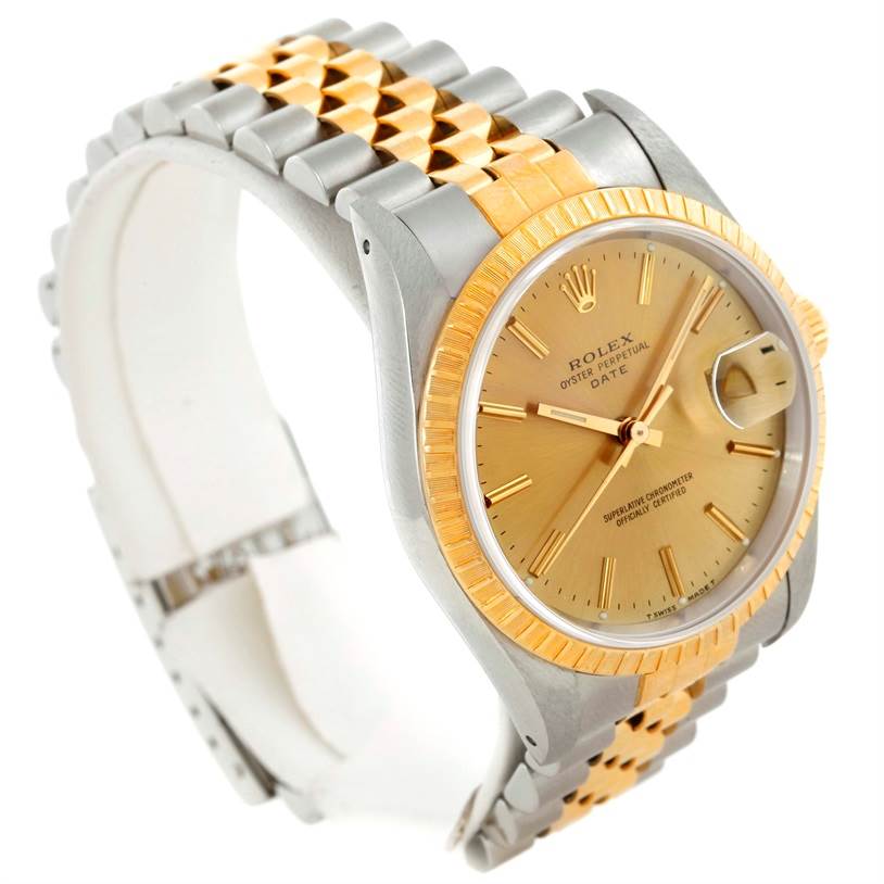 The image shows a side angle of a Rolex Date 15223 Men's Steel and Gold (two tone) Champagne Dial 15223 Men's Steel and Gold (two tone) Champagne Dial model watch, highlighting its two-tone bracelet and dial.