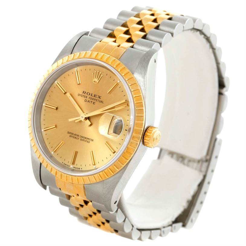 The image shows a Rolex Date 15223 Men's Steel and Gold (two tone) Champagne Dial 15223 Men's Steel and Gold (two tone) Champagne Dial model watch with a gold dial, two-tone bracelet, and fluted bezel at a slightly angled front view.