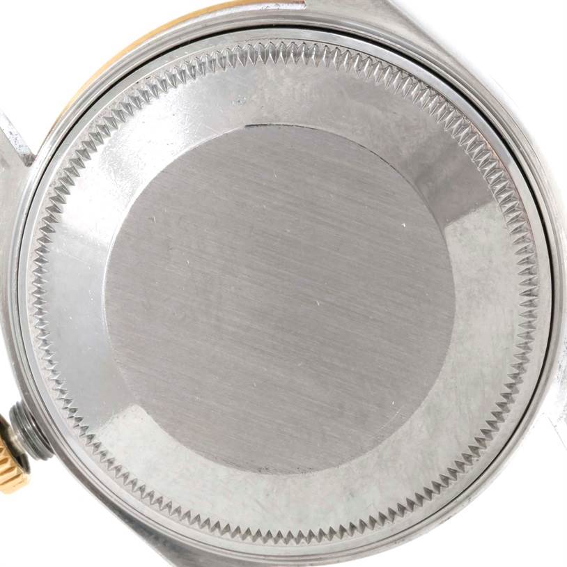 This image shows the back case of a Rolex Date 15053 Men's Stainless Steel Champagne Dial 15053 Men's Stainless Steel Champagne Dial model watch from a top-down angle.