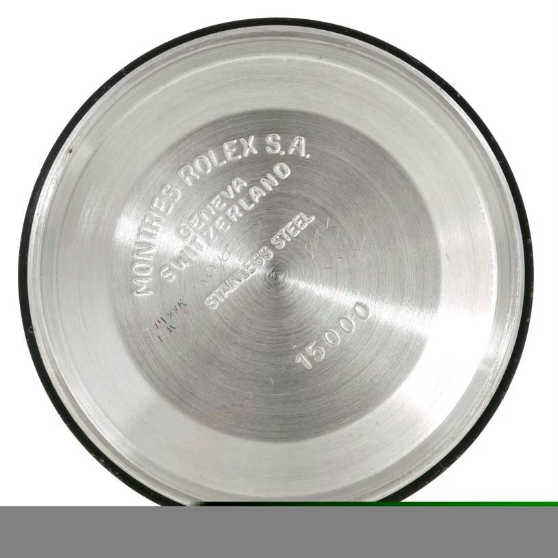 This image shows the case back removed from a Rolex Date 15053 Men's Stainless Steel Champagne Dial 15053 Men's Stainless Steel Champagne Dial watch, displaying the inner engravings.