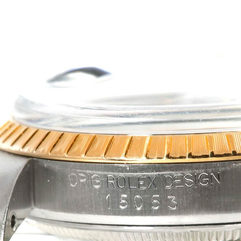 This image shows a close-up side view of the Rolex Date 15053 Men's Stainless Steel Blue Dial 15053 Men's Stainless Steel Blue Dial watch, focusing on the case edge and bezel.
