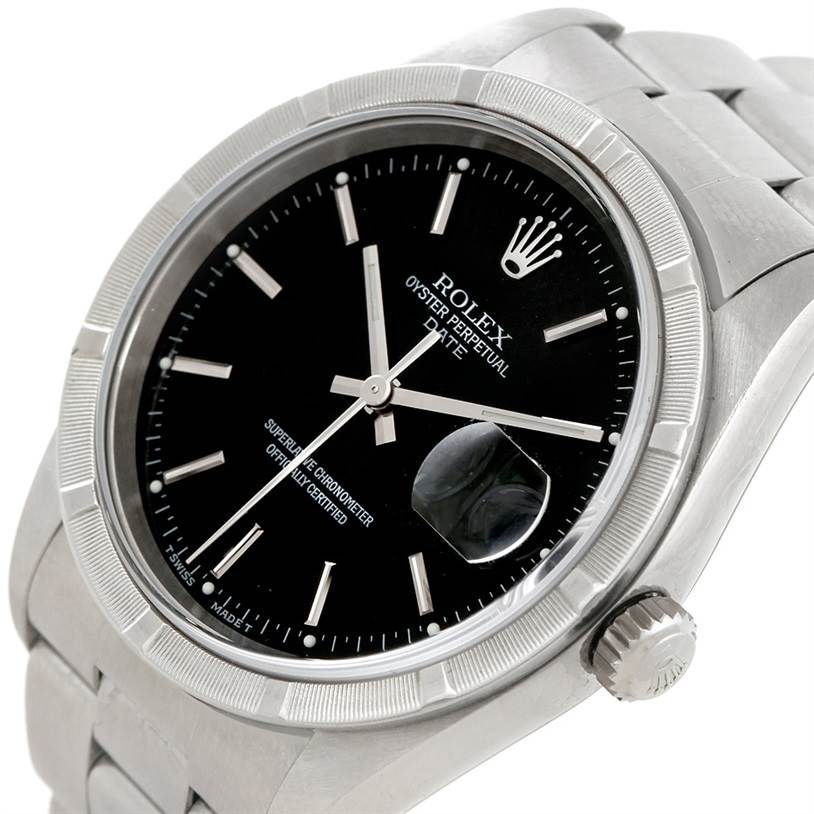 This image shows a close-up angle of the Rolex Date 15210 Men's Stainless Steel Black Dial 15210 Men's Stainless Steel Black Dial Oyster Perpetual, featuring the dial, bezel, crown, and part of the bracelet.