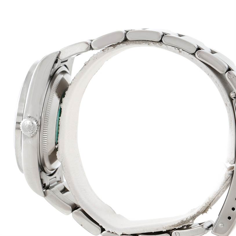 This image shows a side view of a Rolex Date 15210 Men's Stainless Steel Black Dial 15210 Men's Stainless Steel Black Dial model watch, highlighting its case, crown, and bracelet.