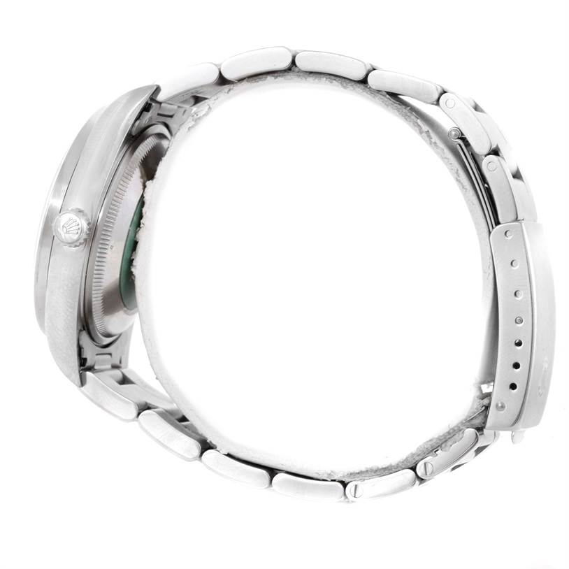 The side profile of a Rolex Date 15210 Men's Stainless Steel White Dial 15210 Men's Stainless Steel White Dial watch is shown, highlighting the bracelet, clasp, and side case.