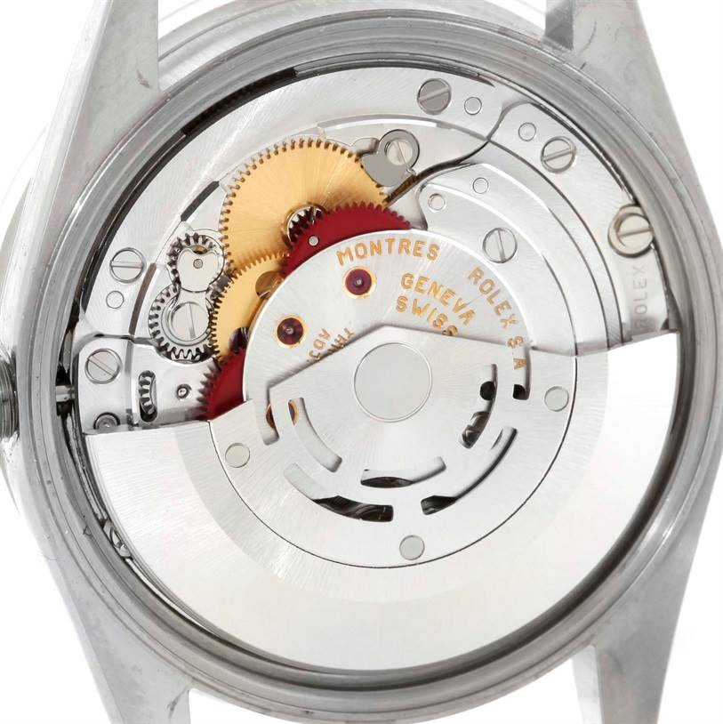 This image shows the inner mechanism and movement parts of a Rolex Date 15210 Men's Stainless Steel White Dial 15210 Men's Stainless Steel White Dial model watch from a rear angle with the back case removed.