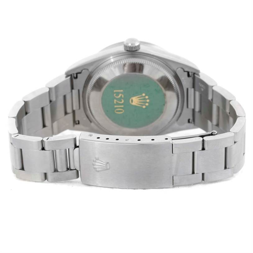 The image shows the back view of a Rolex Date 15210 Men's Stainless Steel White Dial 15210 Men's Stainless Steel White Dial model watch, highlighting the case back and the clasp.