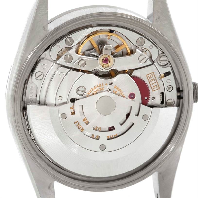 This image shows the back view of a Rolex Date 15200 Men's Stainless Steel Silver Dial 15200 Men's Stainless Steel Silver Dial model, highlighting its intricate mechanical movement and internal components.
