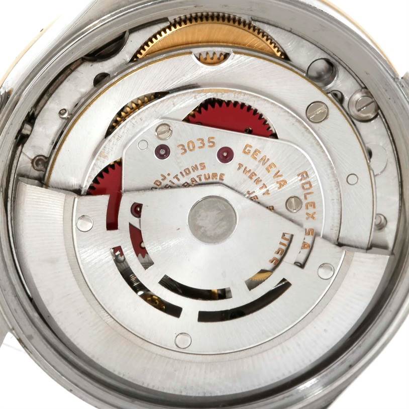 This image shows the internal movement mechanism of a Rolex Date 15053 Men's Stainless Steel Champagne Dial 15053 Men's Stainless Steel Champagne Dial model watch, focusing on the gears and rotors.