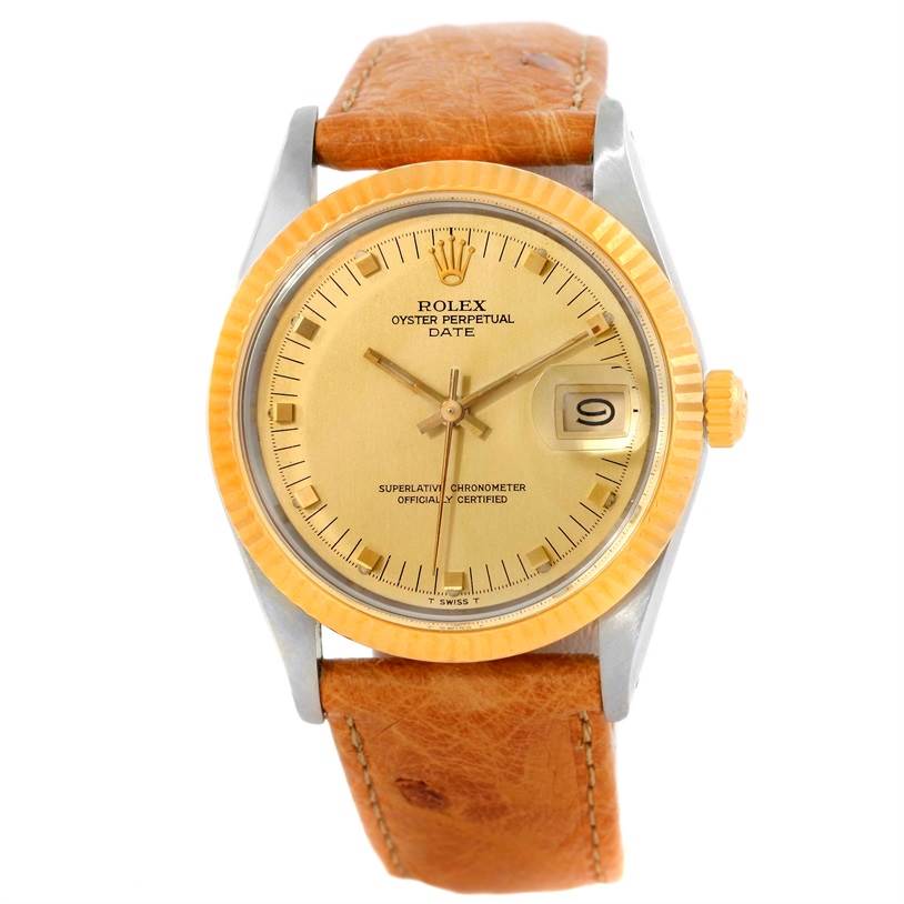 This Rolex Date 15053 Men's Stainless Steel Champagne Dial 15053 Men's Stainless Steel Champagne Dial model watch is shown from a front angle, highlighting its gold dial, fluted bezel, and brown leather strap.
