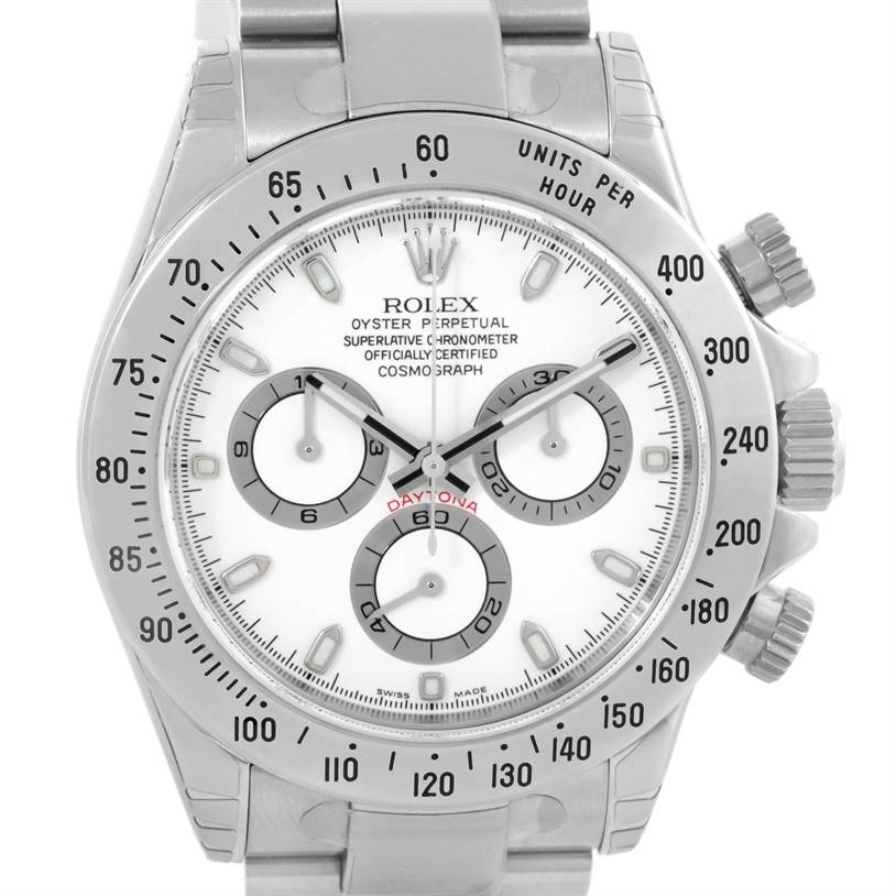The image shows a front view of a Rolex Daytona 116520 Men's Stainless Steel White Dial 116520 Men's Stainless Steel White Dial watch, including its dial, bezel, push buttons, and part of the bracelet.