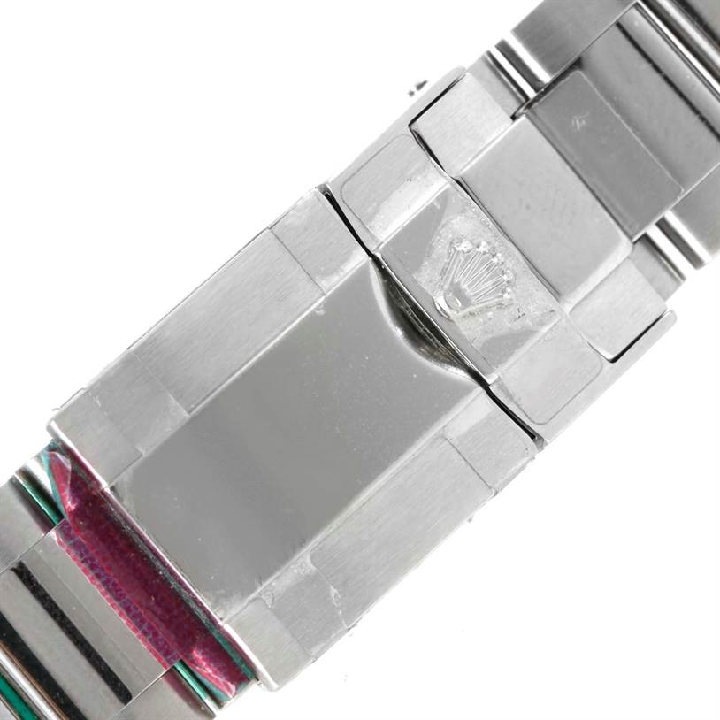This image shows the clasp and part of the bracelet of a Rolex Daytona 116520 Men's Stainless Steel White Dial 116520 Men's Stainless Steel White Dial watch.