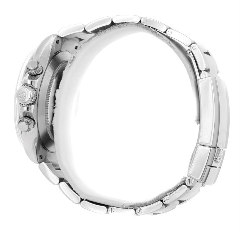 This side view of the Rolex Daytona 116520 Men's Stainless Steel Black Dial 116520 Men's Stainless Steel Black Dial watch shows the crown, pushers, and parts of the metal bracelet.