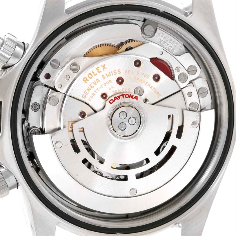 The image shows the intricate back view of the movement mechanism of a Rolex Daytona 116520 Men's Stainless Steel Black Dial 116520 Men's Stainless Steel Black Dial watch.