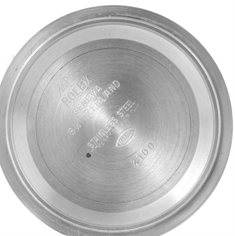 This image shows the inner case back of a Rolex Daytona 116523 Men's Steel and Gold (two tone) Black Dial 116523 Men's Steel and Gold (two tone) Black Dial watch, featuring engravings.