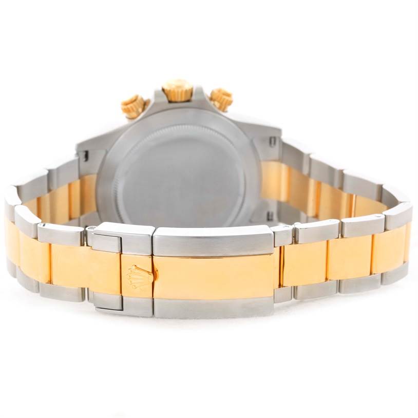 The image shows the back view of a Rolex Daytona 116523 Men's White Dial 116523 Men's White Dial watch, highlighting its two-tone metal bracelet and clasp.