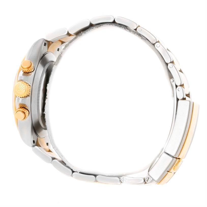 This image shows a side view of the Rolex Daytona 116523 Men's White Dial 116523 Men's White Dial watch, highlighting its crown, pushers, and metal bracelet.