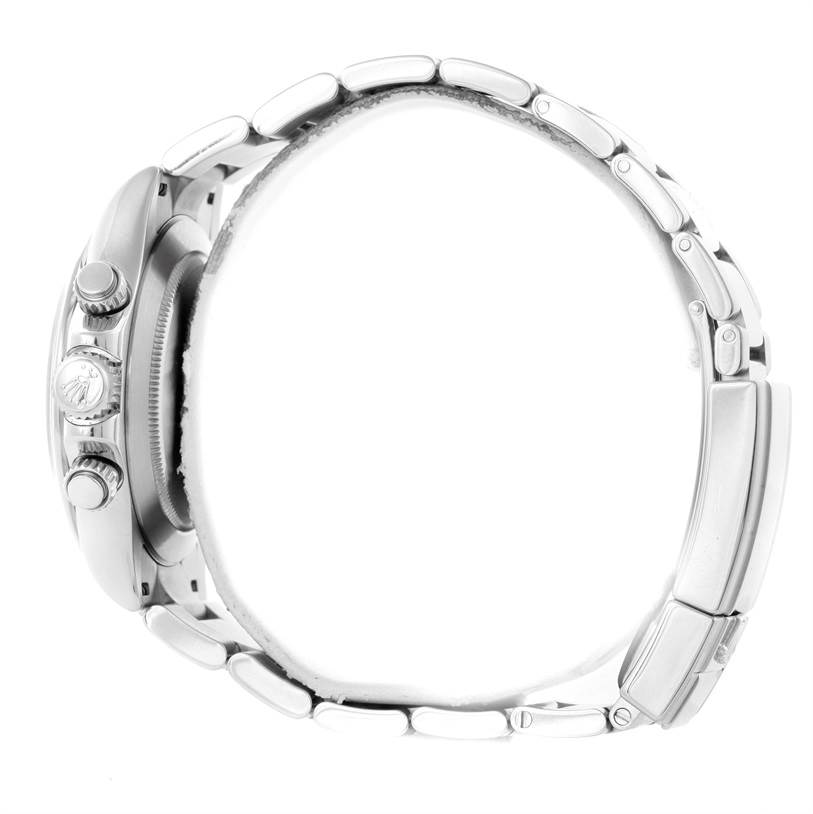 This image shows the side view of a Rolex Daytona 116520 Men's Stainless Steel White Dial 116520 Men's Stainless Steel White Dial watch, displaying its case, pushers, crown, and bracelet links.