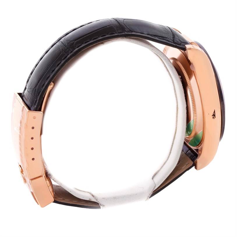 This side-angle view shows the strap, case, and clasp of a Rolex Daytona 116515LN Men's Rose Gold Brown Dial 116515LN Men's Rose Gold Brown Dial watch.