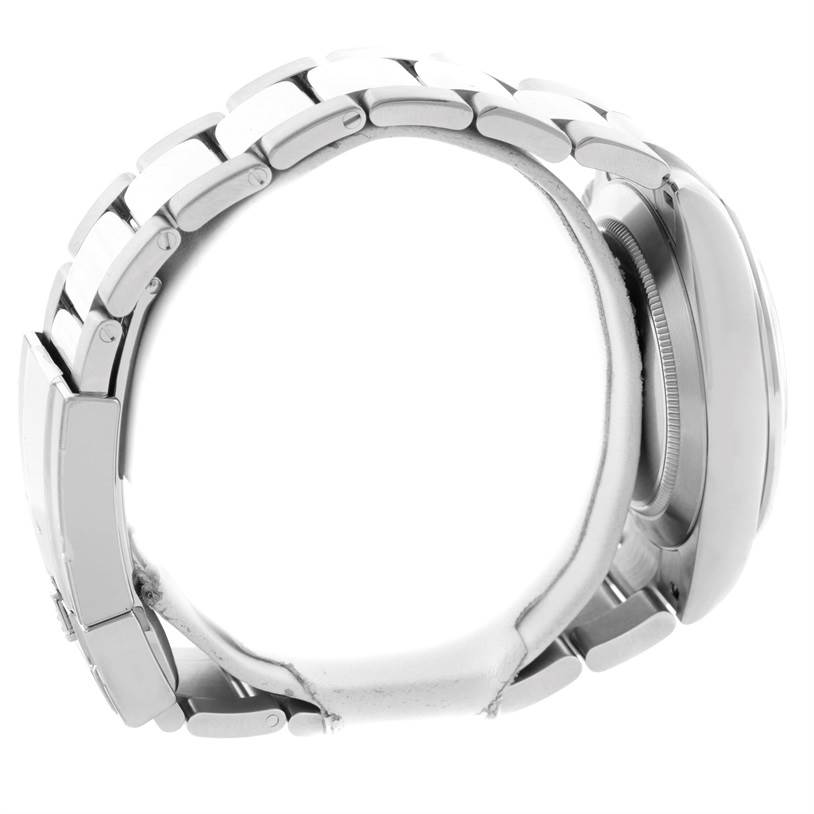 The image shows a side view of the bracelet and case of a Rolex Daytona 116520 Men's Stainless Steel White Dial 116520 Men's Stainless Steel White Dial watch.