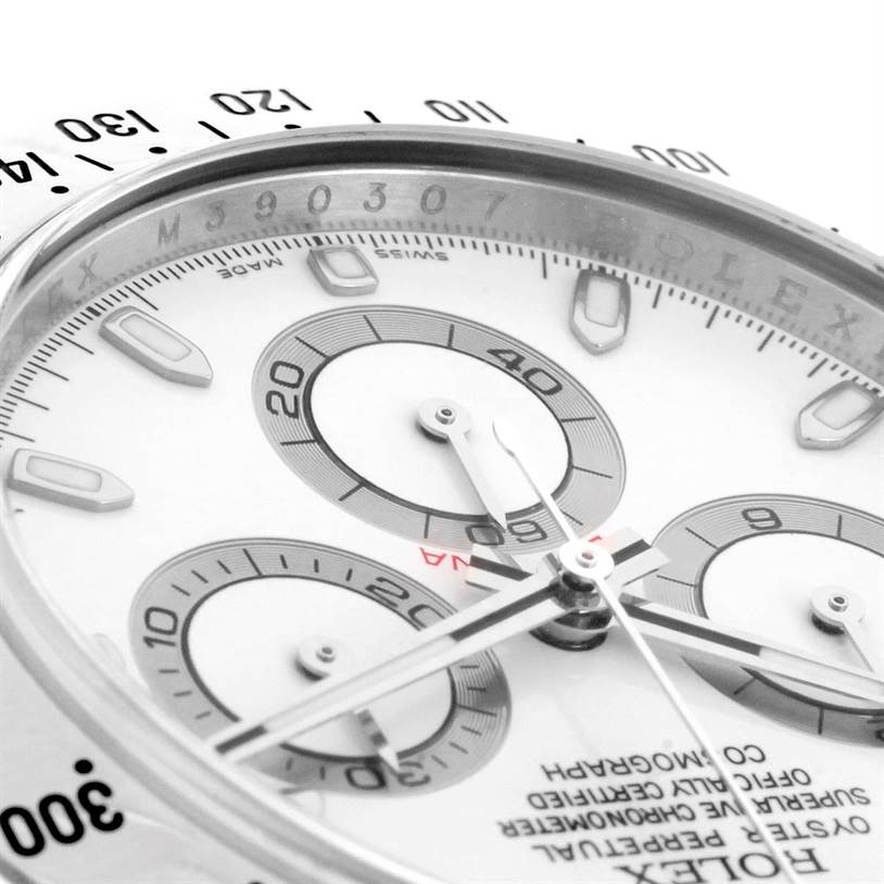 The image shows a close-up angle of the dial and bezel of a Rolex Daytona 116520 Men's Stainless Steel White Dial 116520 Men's Stainless Steel White Dial watch.