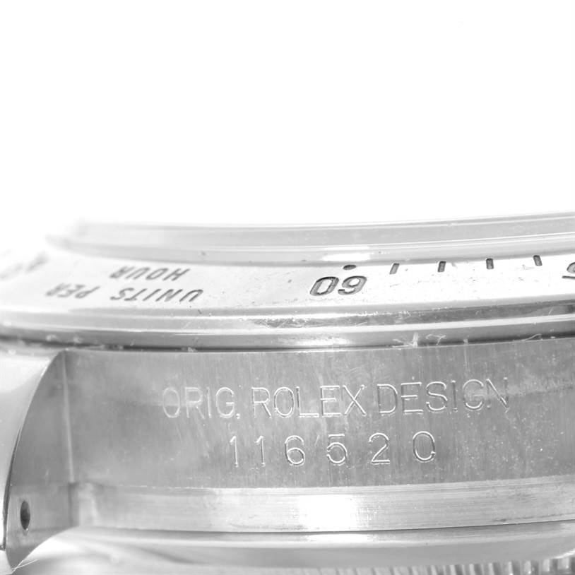 The image shows the side angle of a Rolex Daytona 116520 Men's Stainless Steel White Dial 116520 Men's Stainless Steel White Dial watch, highlighting the bezel and engraved model number 116520.