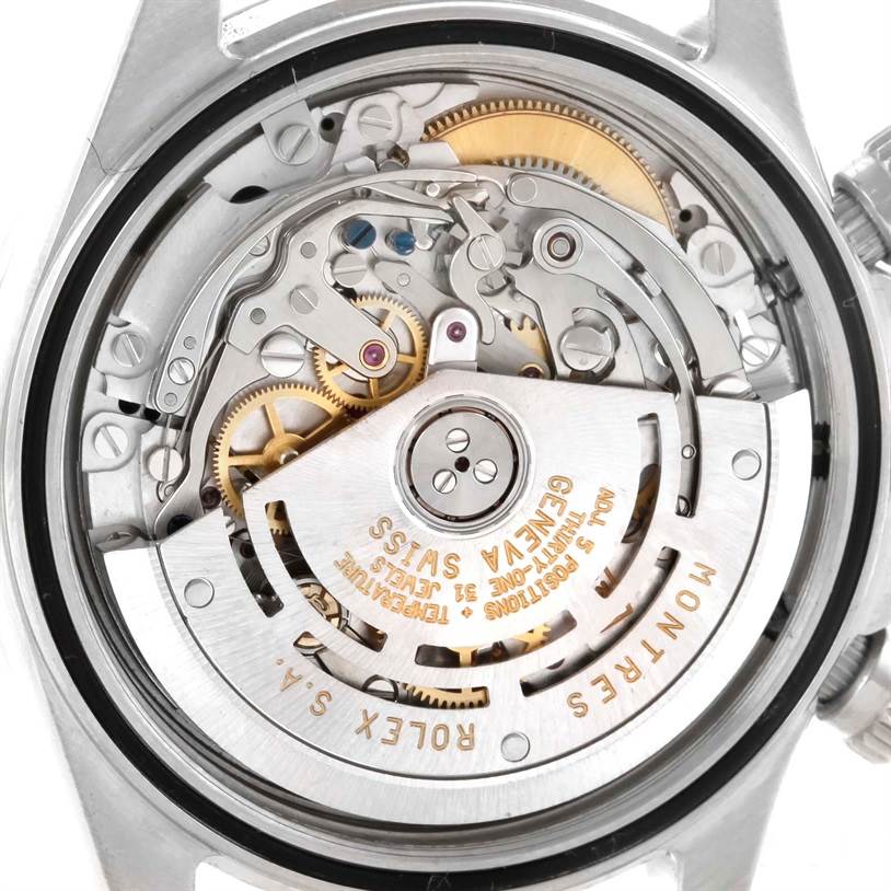 This image shows the internal mechanism of the Rolex Daytona 16520 Men's Stainless Steel Black Dial 16520 Men's Stainless Steel Black Dial watch, focusing on the movement and gears.