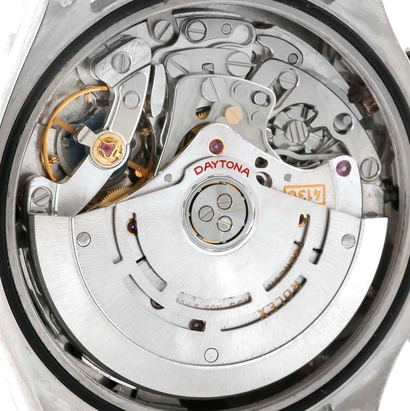 The image shows the movement mechanism of a Rolex Daytona 116509 Men's White Gold Silver Dial 116509 Men's White Gold Silver Dial watch, focusing on its intricate inner workings.