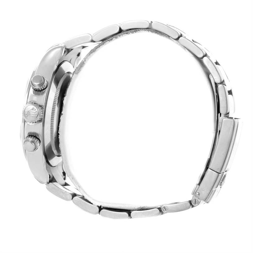 The Rolex Daytona 116509 Men's White Gold Silver Dial 116509 Men's White Gold Silver Dial watch is shown from the side, highlighting the crown, pushers, and bracelet.