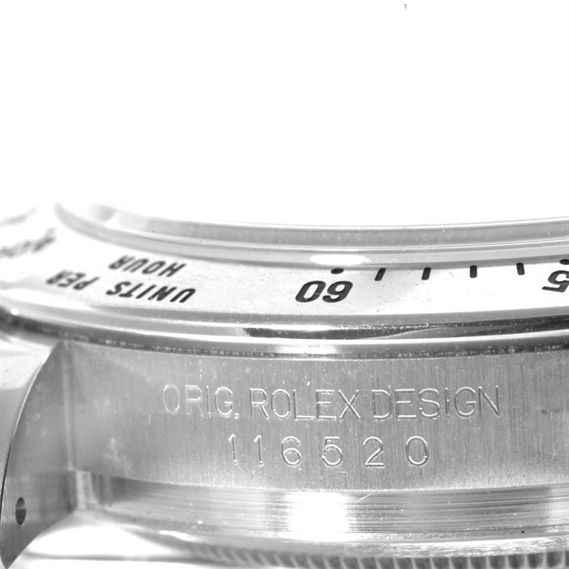 This image shows a detailed side view of the bezel and casing, including the model number engraving, of a Rolex Daytona 116520 Men's Stainless Steel Black Dial 116520 Men's Stainless Steel Black Dial watch.