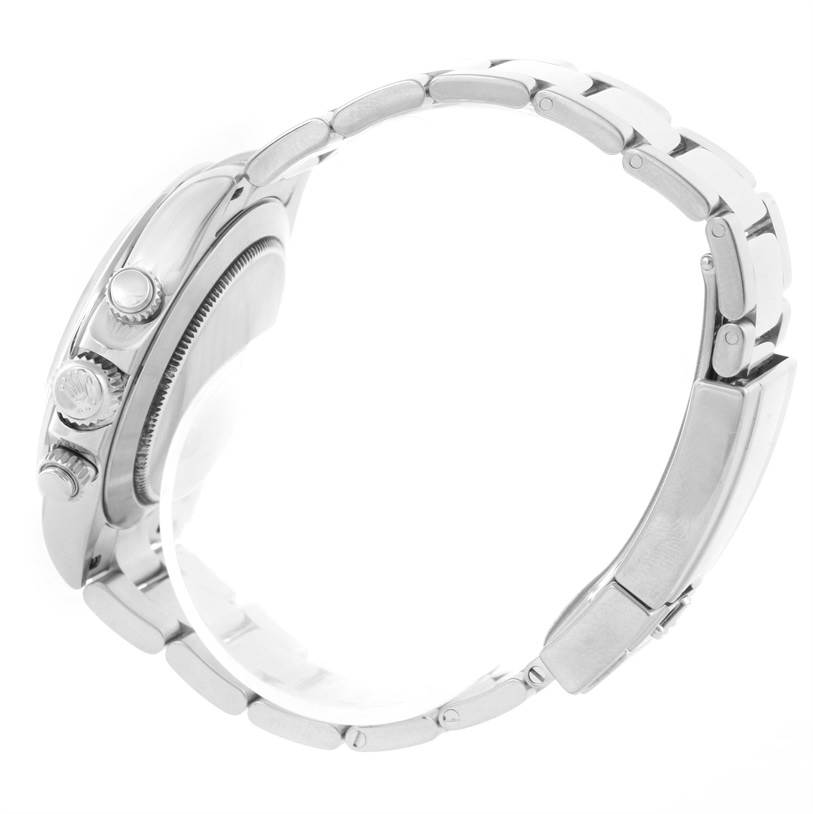 The image shows a side view of a Rolex Daytona 116520 Men's Stainless Steel White Dial 116520 Men's Stainless Steel White Dial watch, highlighting its pushers, crown, and part of the bracelet.
