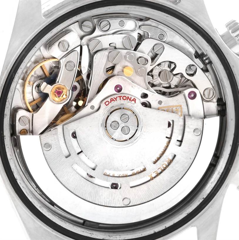 This image shows the Rolex Daytona 116520 Men's Stainless Steel White Dial 116520 Men's Stainless Steel White Dial watch movement from a close-up view of its intricate internal components.