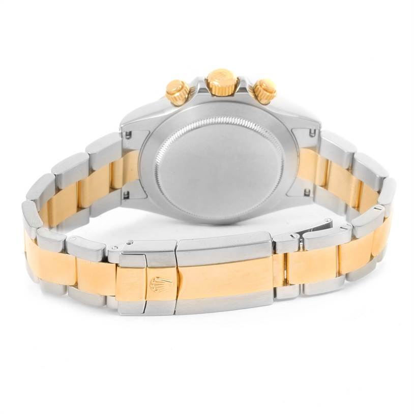 This image shows the back view of a Rolex Daytona 116523 Men's Steel and Gold (two tone) Champagne Dial 116523 Men's Steel and Gold (two tone) Champagne Dial watch, highlighting the bracelet and clasp with the Rolex logo.