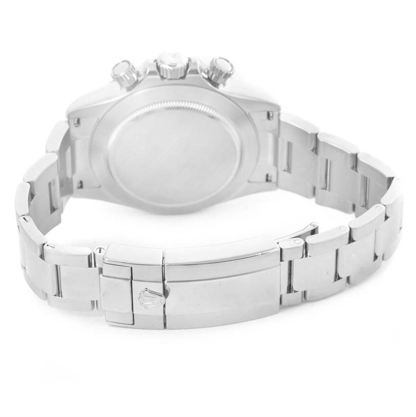 The image shows the back view of a Rolex Daytona 116520 Men
s Stainless Steel Black Dial 116520 Men
s Stainless Steel Black Dial watch, showcasing its clasp, bracelet, and caseback.