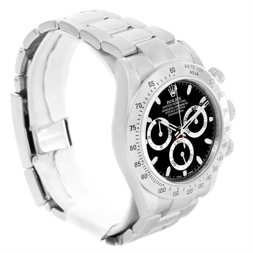 The image shows a Rolex Daytona 116520 Men
s Stainless Steel Black Dial 116520 Men
s Stainless Steel Black Dial watch at a three-quarter angle, highlighting the face, bezel, and part of the bracelet.