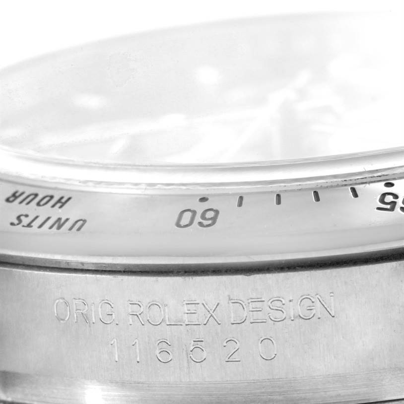 This image shows a close-up of the bezel and side of the case of a Rolex Daytona 116520 Men's Stainless Steel Black Dial 116520 Men's Stainless Steel Black Dial watch, displaying the model number 116520.