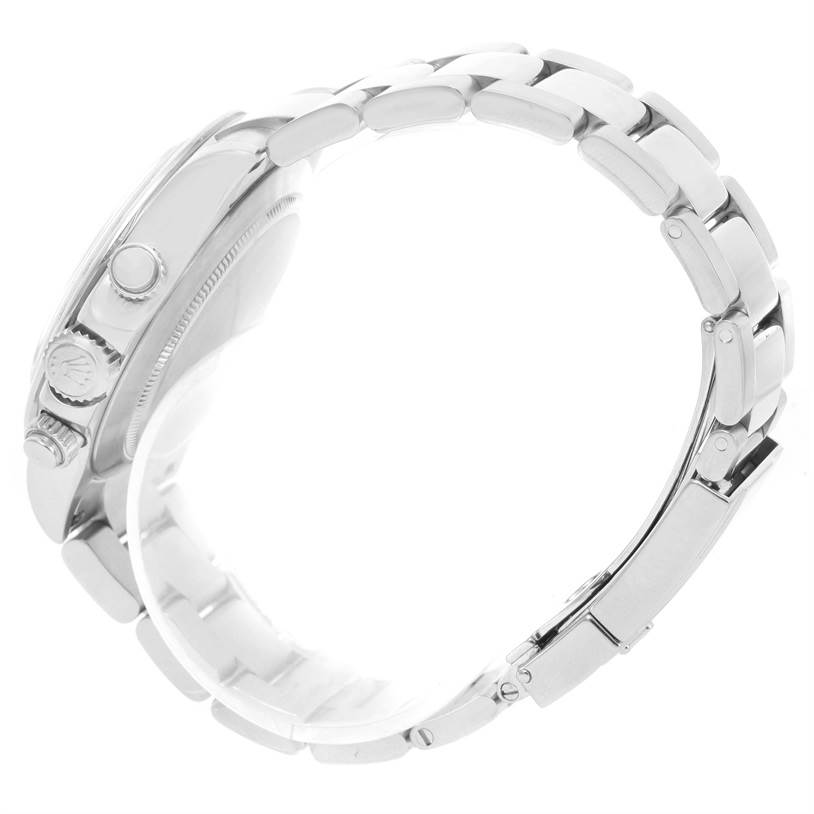 The image shows a side view of a Rolex Daytona 116520 Men's Stainless Steel White Dial 116520 Men's Stainless Steel White Dial watch, highlighting the bracelet, case, and crown.