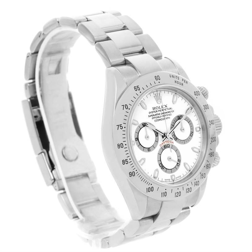 The Rolex Daytona 116520 Men's Stainless Steel White Dial 116520 Men's Stainless Steel White Dial watch is shown at a three-quarter angle, displaying the face, bezel, and part of the bracelet.