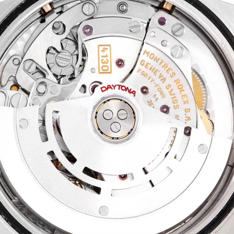 This image shows the intricate internal movement mechanism of a Rolex Daytona 116523 Men's Steel and Gold (two tone) Black Dial 116523 Men's Steel and Gold (two tone) Black Dial watch.