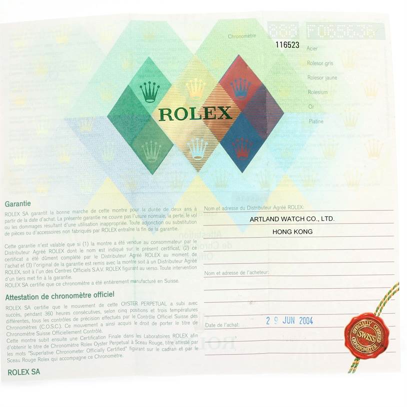 This image shows a warranty card for the Rolex Daytona 116523 Men's Steel and Gold (two tone) Black Dial 116523 Men's Steel and Gold (two tone) Black Dial watch model.