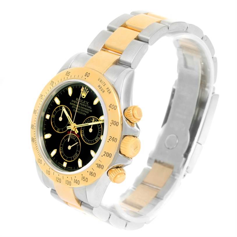 The image shows a side view of a Rolex Daytona 116523 Men's Steel and Gold (two tone) Black Dial 116523 Men's Steel and Gold (two tone) Black Dial watch, highlighting its bezel, crown, pushers, and two-tone bracelet.
