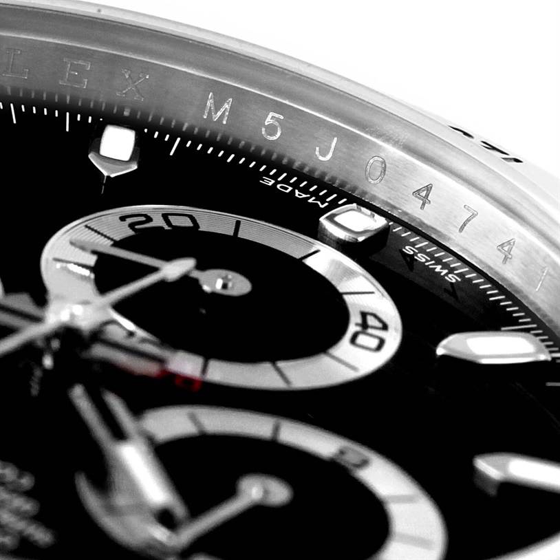 The image shows a close-up of the dial and tachymeter bezel of a Rolex Daytona 116520 Men's Stainless Steel Black Dial 116520 Men's Stainless Steel Black Dial watch.
