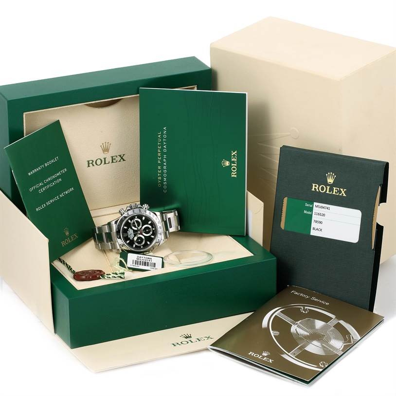 This image shows a Rolex Daytona 116520 Men's Stainless Steel Black Dial 116520 Men's Stainless Steel Black Dial watch with its box, warranty booklet, certification, and accompanying accessories.
