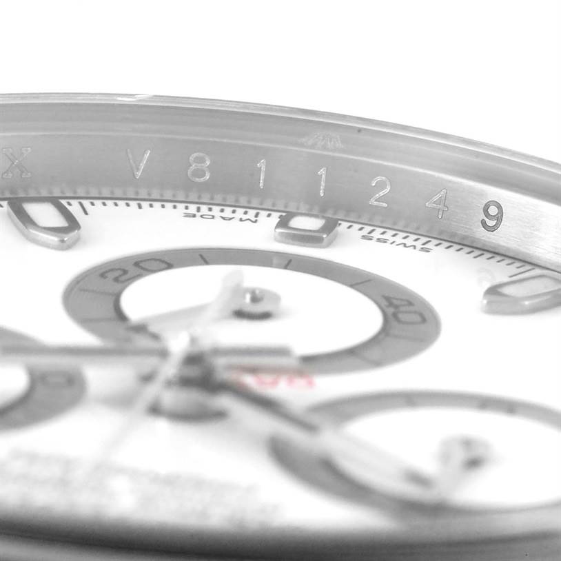 The image shows a close-up, angled view of the dial and bezel of a Rolex Daytona 116520 Men's Stainless Steel White Dial 116520 Men's Stainless Steel White Dial watch.
