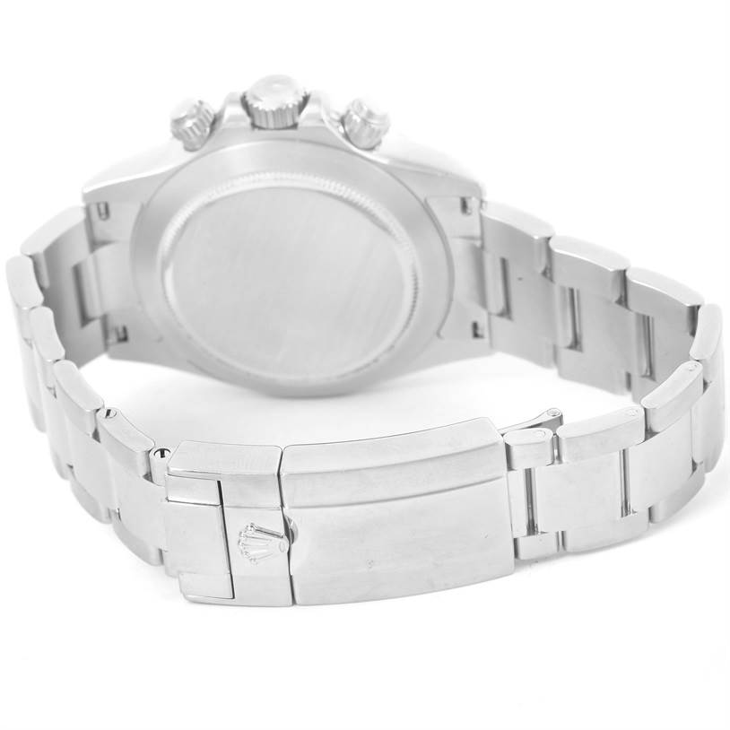 The image shows the back view of a Rolex Daytona 116520 Men's Stainless Steel White Dial 116520 Men's Stainless Steel White Dial watch, highlighting its case, bracelet, and clasp.