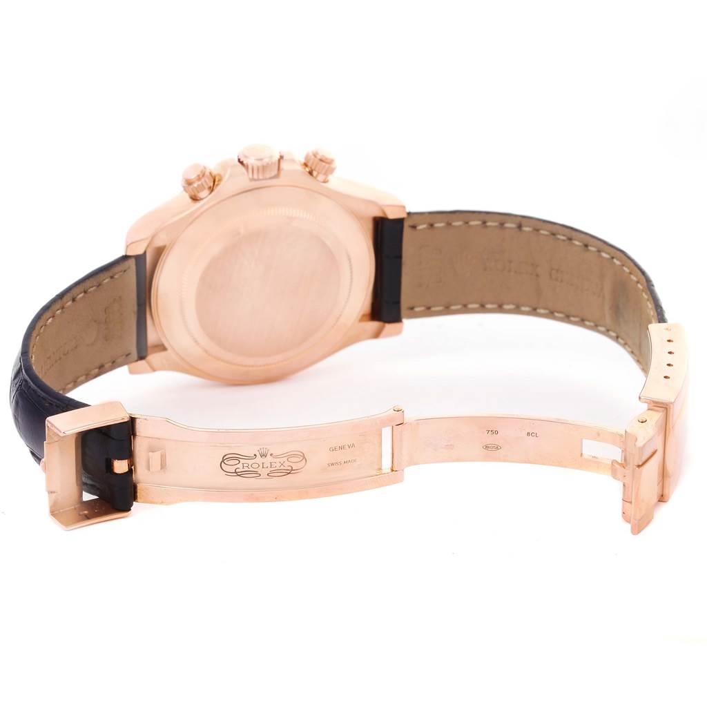 The image shows the back view of a Rolex Daytona 116515LN Men
s Rose Gold Brown Dial 116515LN Men
s Rose Gold Brown Dial watch, highlighting the case back, crown, and open clasp.