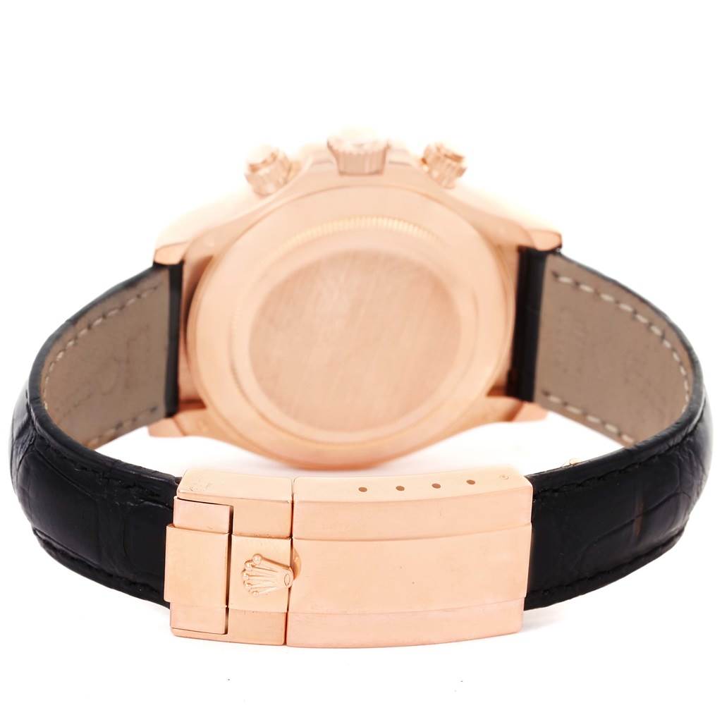 The image shows the back case and clasp of the Rolex Daytona 116515LN Men
s Rose Gold Brown Dial 116515LN Men
s Rose Gold Brown Dial watch, highlighted with its leather strap.